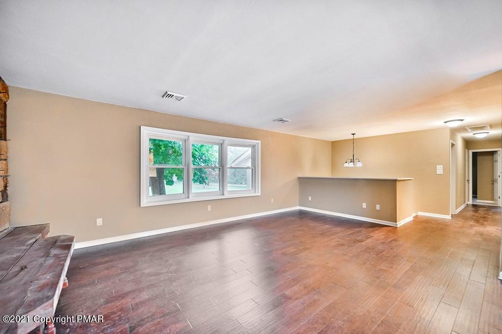 171 VanWhy Road Bushkill, PA 18324 - Photo 9 of 61 a view of an empty room with a window