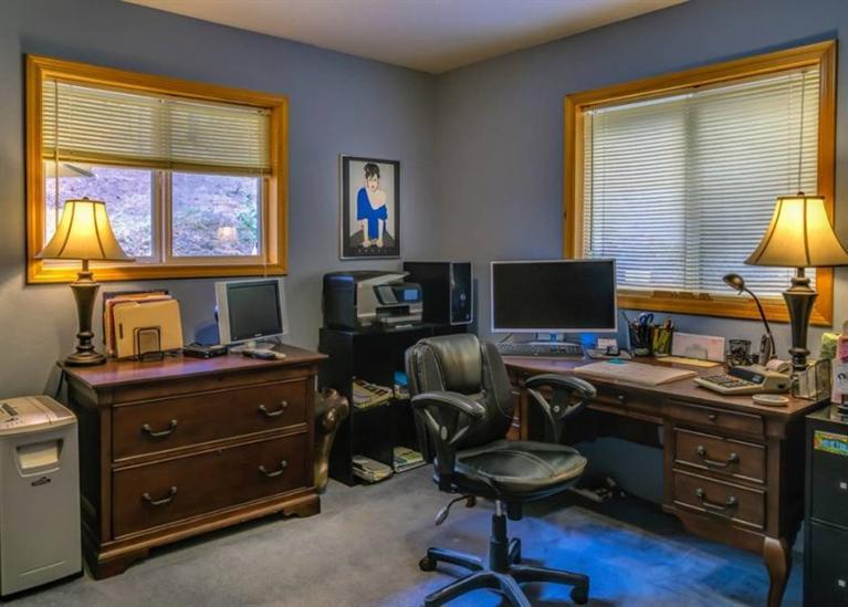 8707 Yank Gulch Road Talent, OR 97540 - Photo 10 of 19 a view of a workspace with furniture and a window