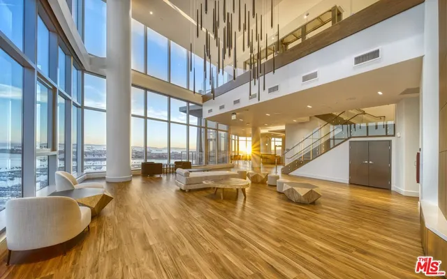 a view of an outdoor space with swimming pool and furniture