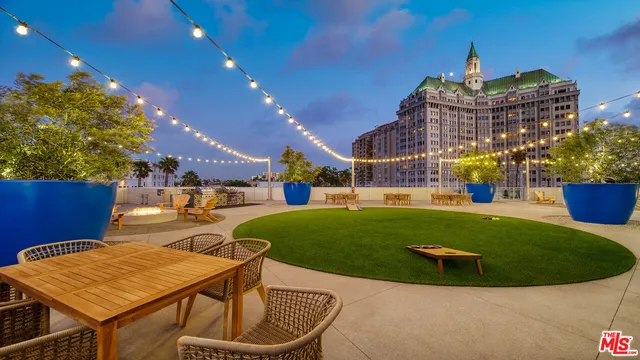 a view of a swimming pool and a yard