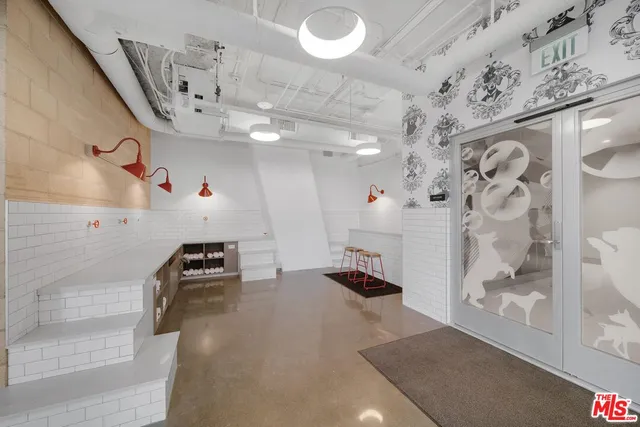 a dining room with furniture and a fireplace