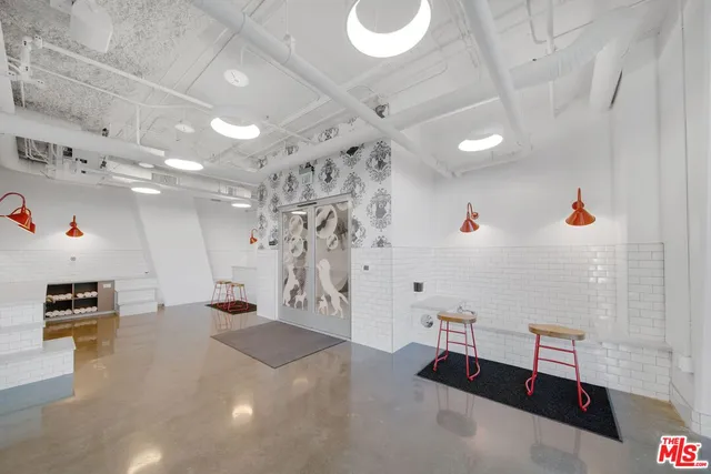 a view of a house with a yard and a fence