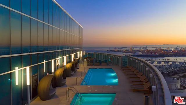 a view of balcony with furniture
