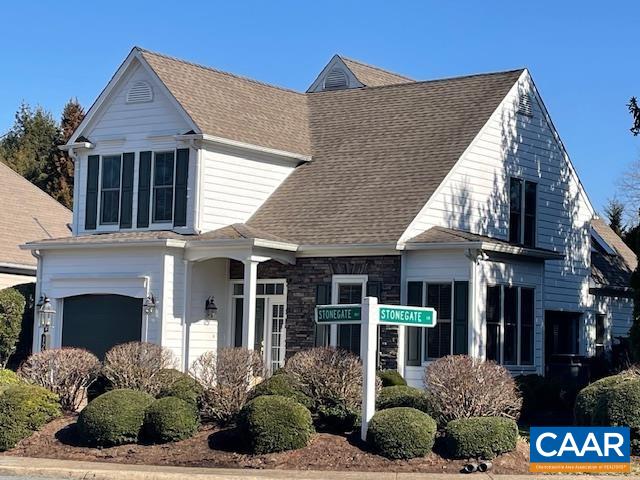a view of a house with a bunch of plants