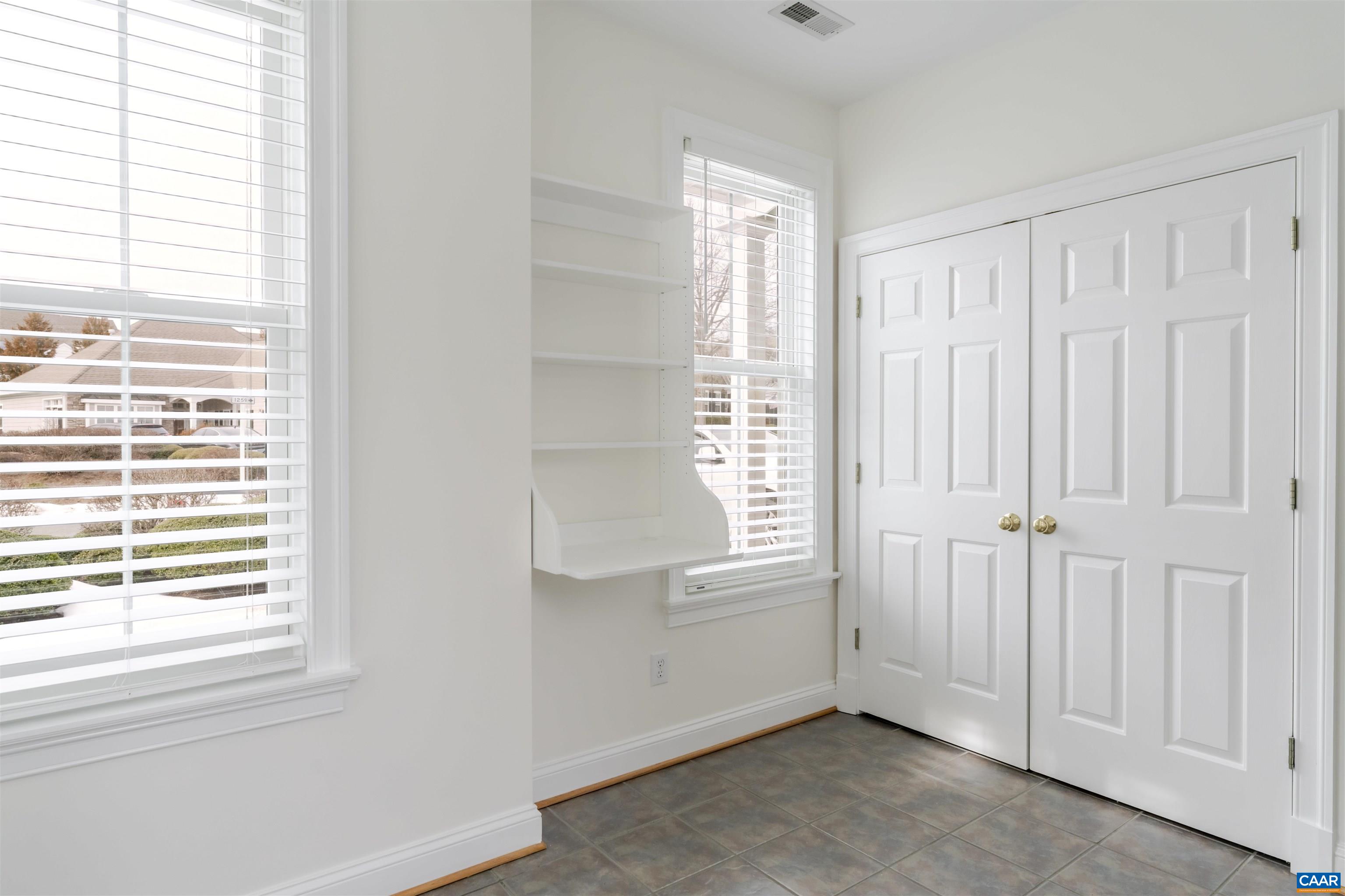 1202 Stonegate Way Crozet, VA 22932 - Photo 17 of 42 a view of an empty room with a window