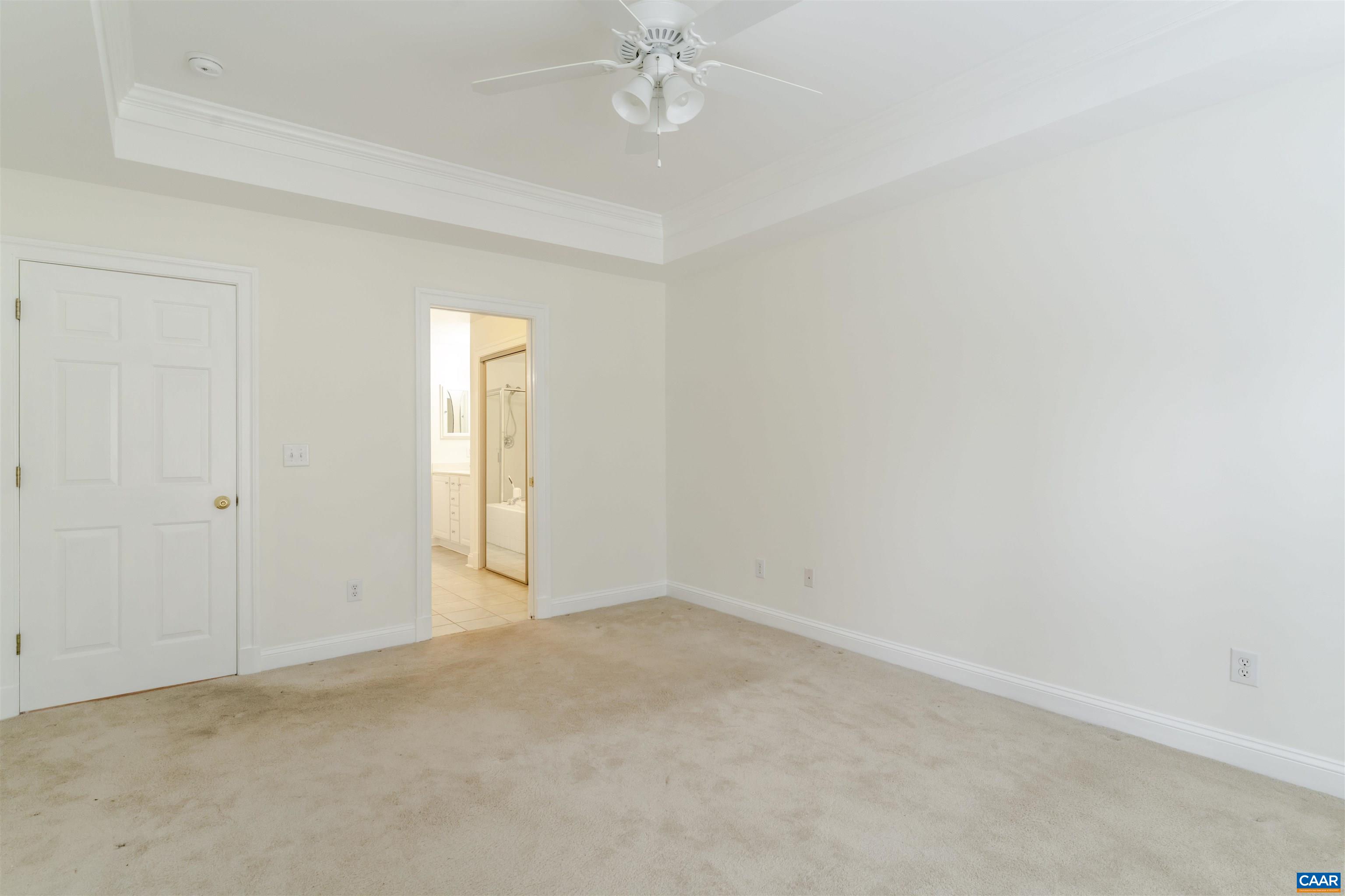 1202 Stonegate Way Crozet, VA 22932 - Photo 20 of 42 an empty room with a fan and a window