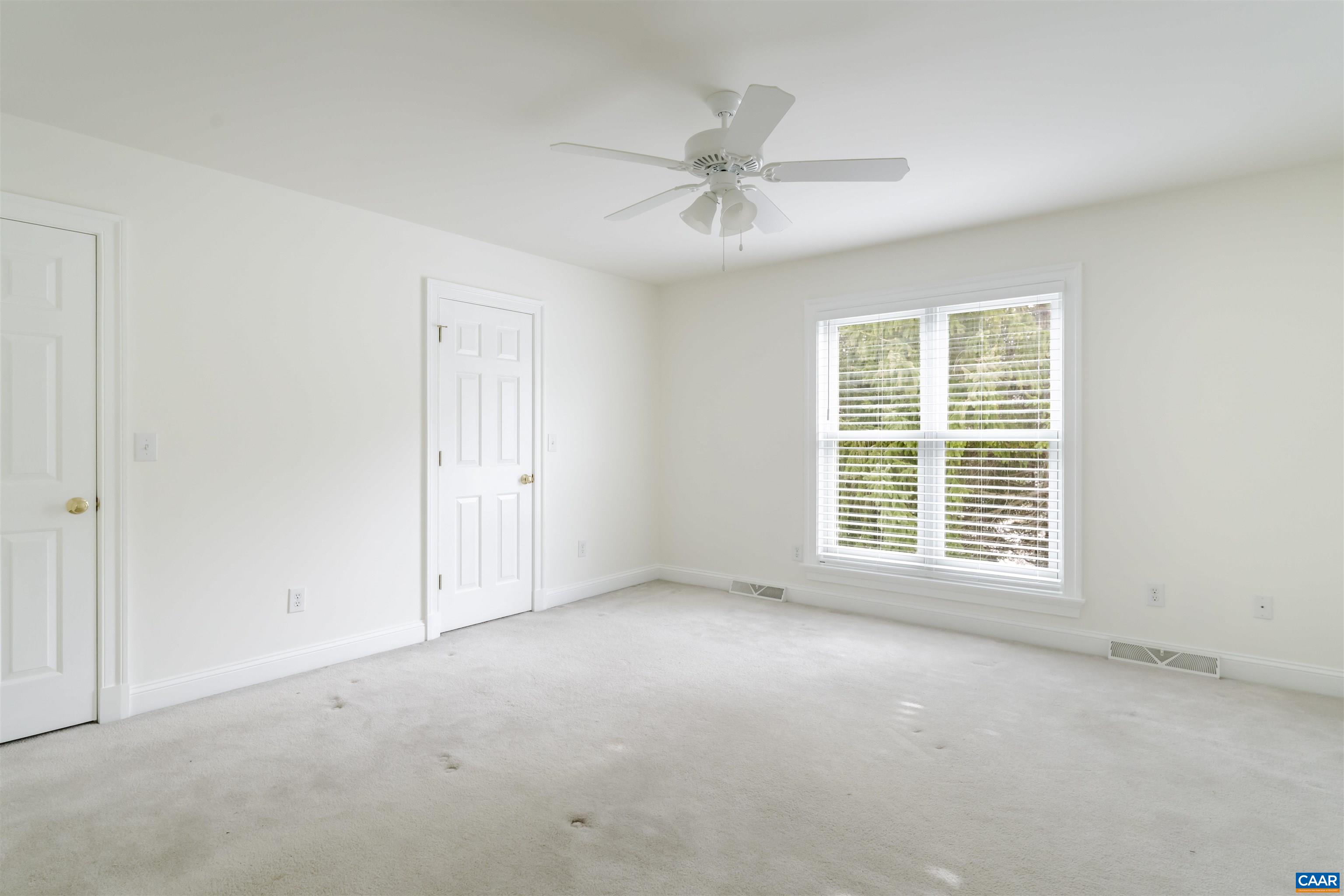 1202 Stonegate Way Crozet, VA 22932 - Photo 23 of 42 a view of an empty room with a window