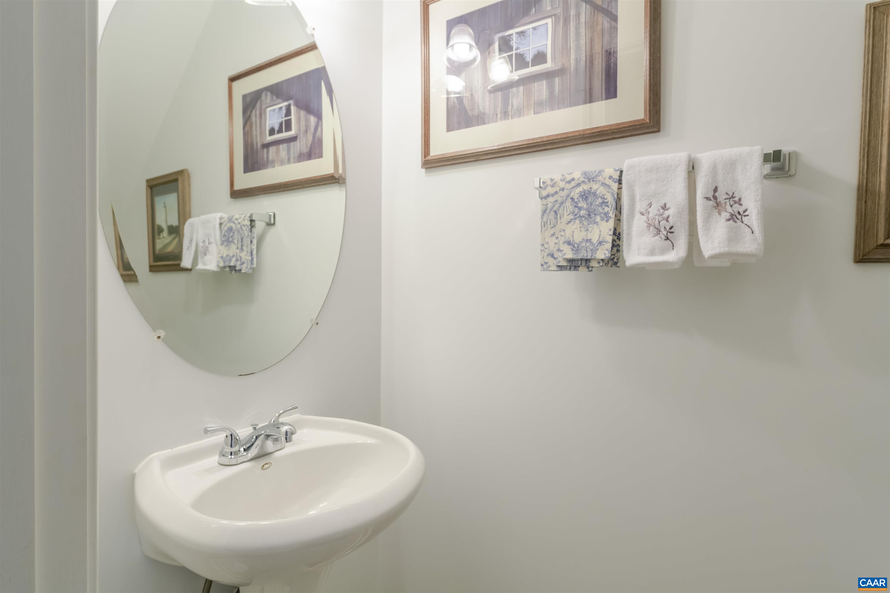 1202 Stonegate Way Crozet, VA 22932 - Photo 33 of 42 a bathroom with a sink and a mirror