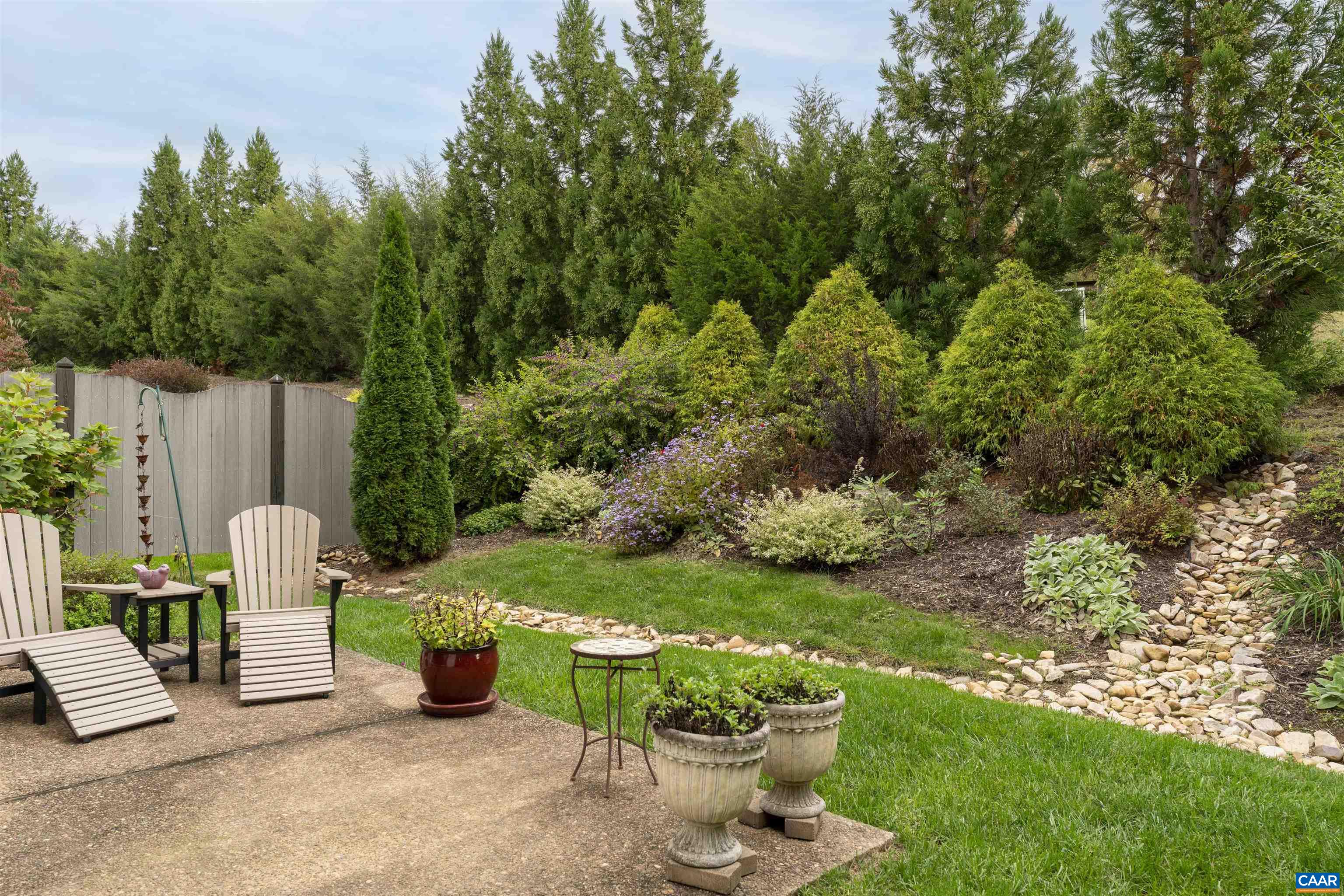 1202 Stonegate Way Crozet, VA 22932 - Photo 41 of 42 a view of a chair and table in the garden