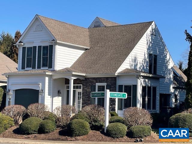 1202 Stonegate Way Crozet, VA 22932 - Photo 42 of 42 a front view of a house with a garden