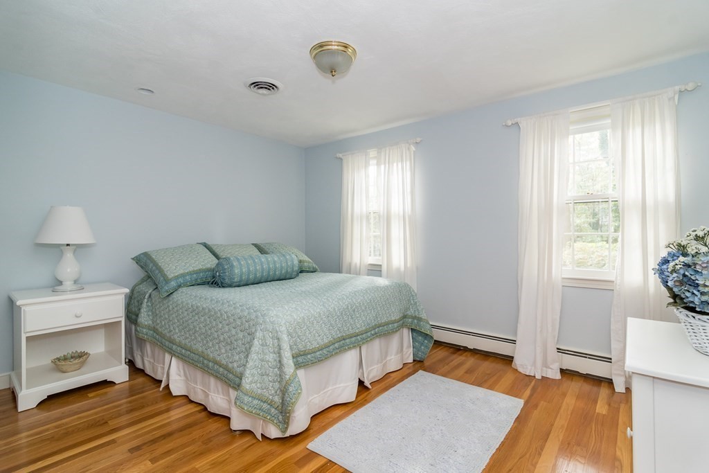 17 Colonial Drive Framingham, MA 01701 - Photo 14 of 27 a bed room with a bed and a tv