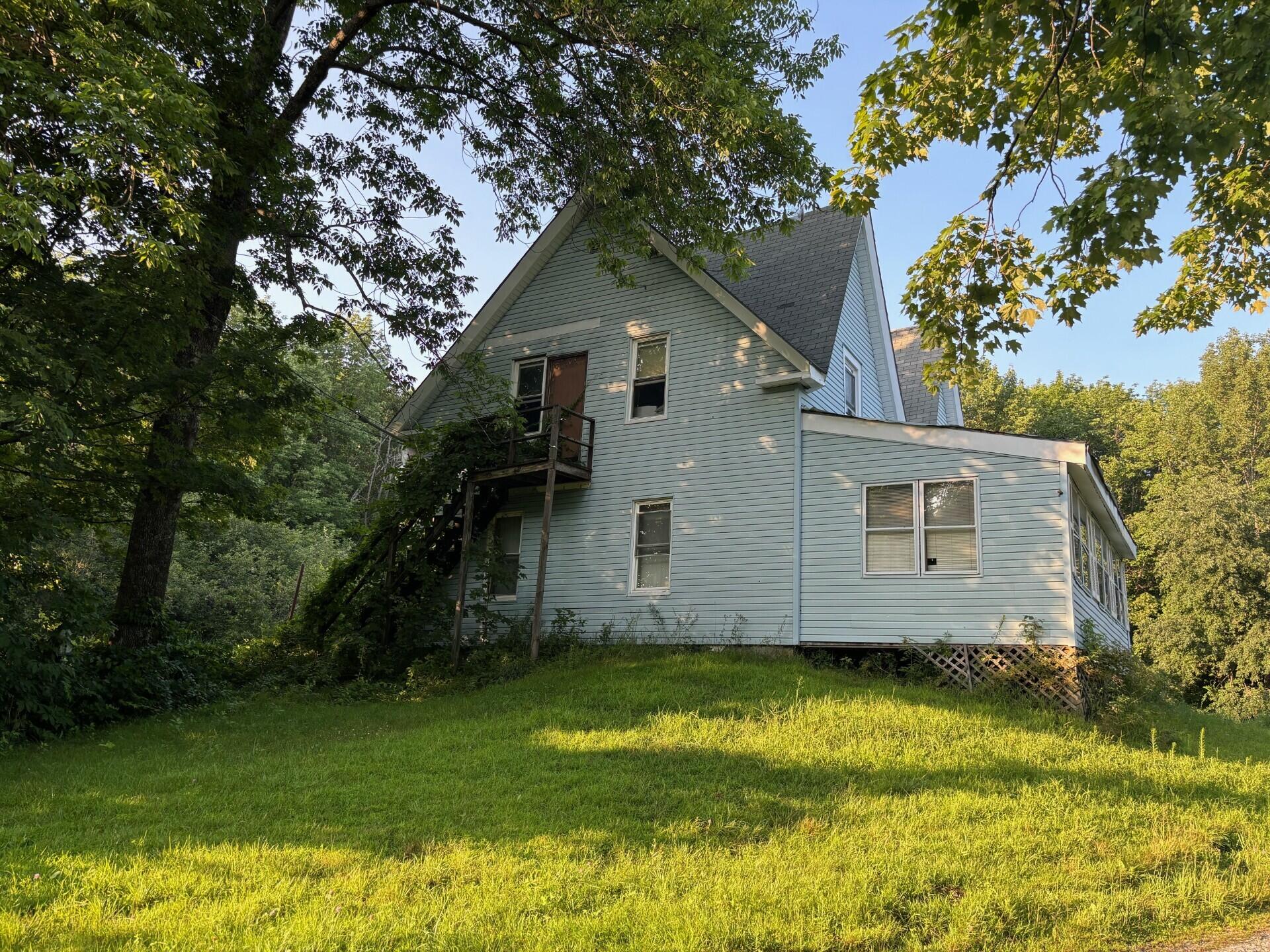 79 Walker Hill Road Jay, ME 04239 - Photo 4 of 23 0401 Sanders side exterior stairs