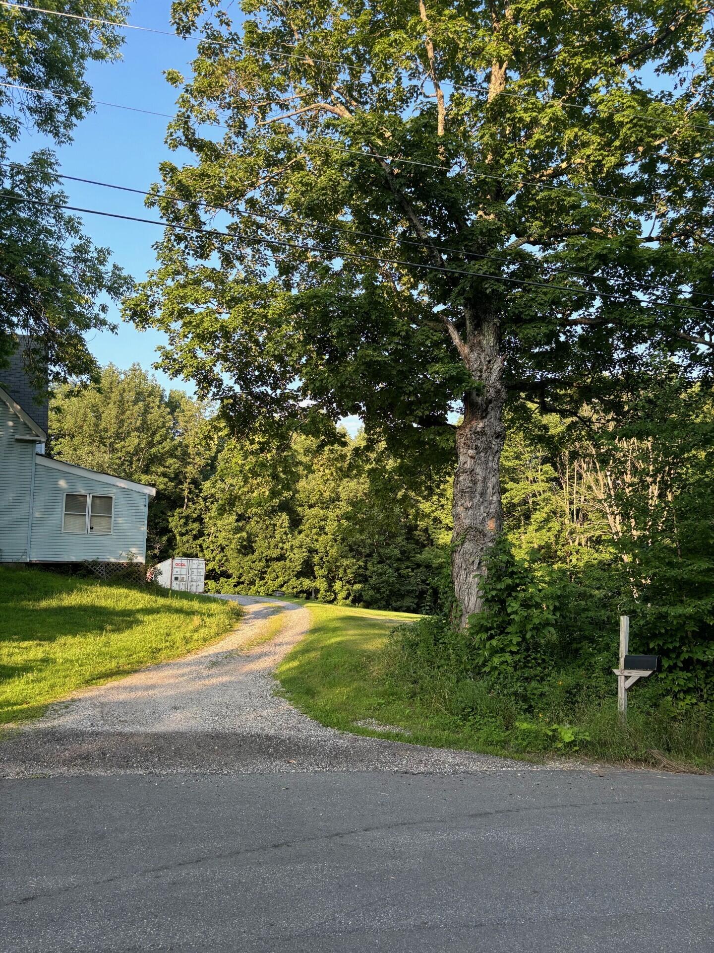 79 Walker Hill Road Jay, ME 04239 - Photo 5 of 23 0401 Sanders exterior side view