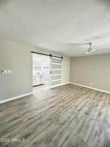 a view with cabinet and mirror