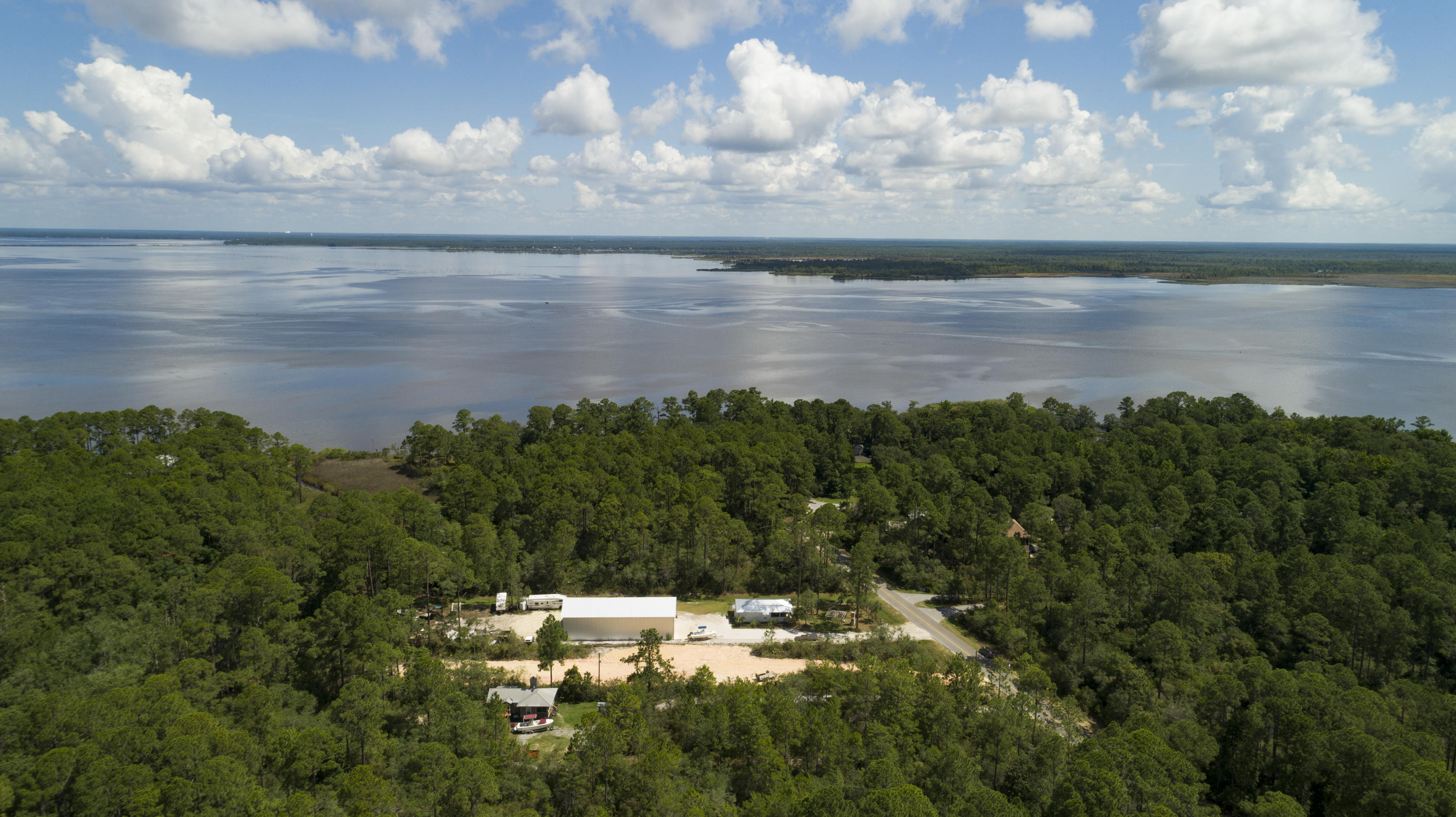 Lot 31 Dick Saltsman Road Santa Rosa Beach, FL 32459 - Photo 9 of 9 a view of a lake from a yard