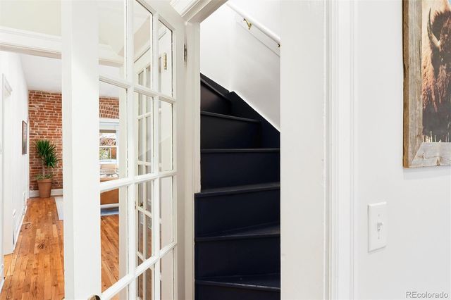 a large white bed in a white room