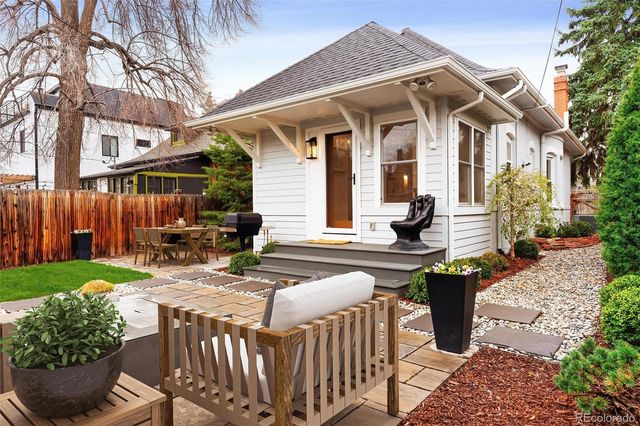 an aerial view of residential building with parking