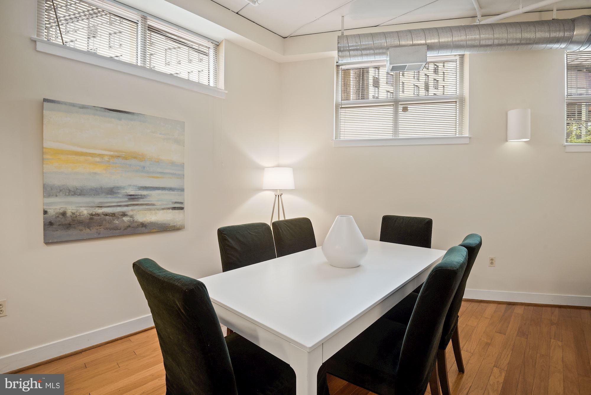 902 Bonifant Street, Unit A Silver Spring, MD 20910 - Photo 11 of 32 Nice size dining area w/ gleaming hardwood floors