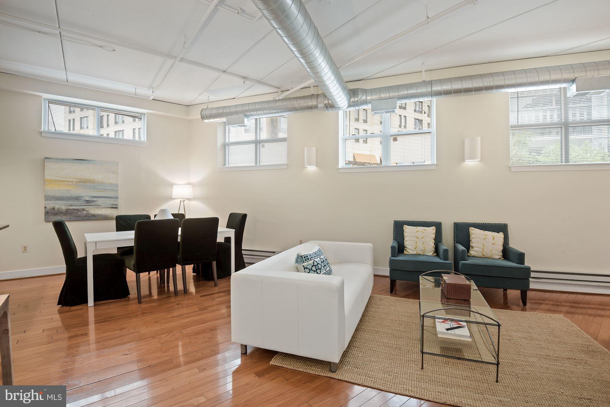 902 Bonifant Street, Unit A Silver Spring, MD 20910 - Photo 3 of 32 Lrg living+dining area w/gleaming hardwood floors