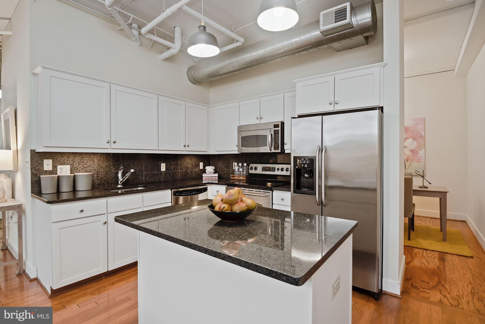 902 Bonifant Street, Unit A Silver Spring, MD 20910 - Photo 7 of 32 Open gourmet kitchen with granite+SS appliances