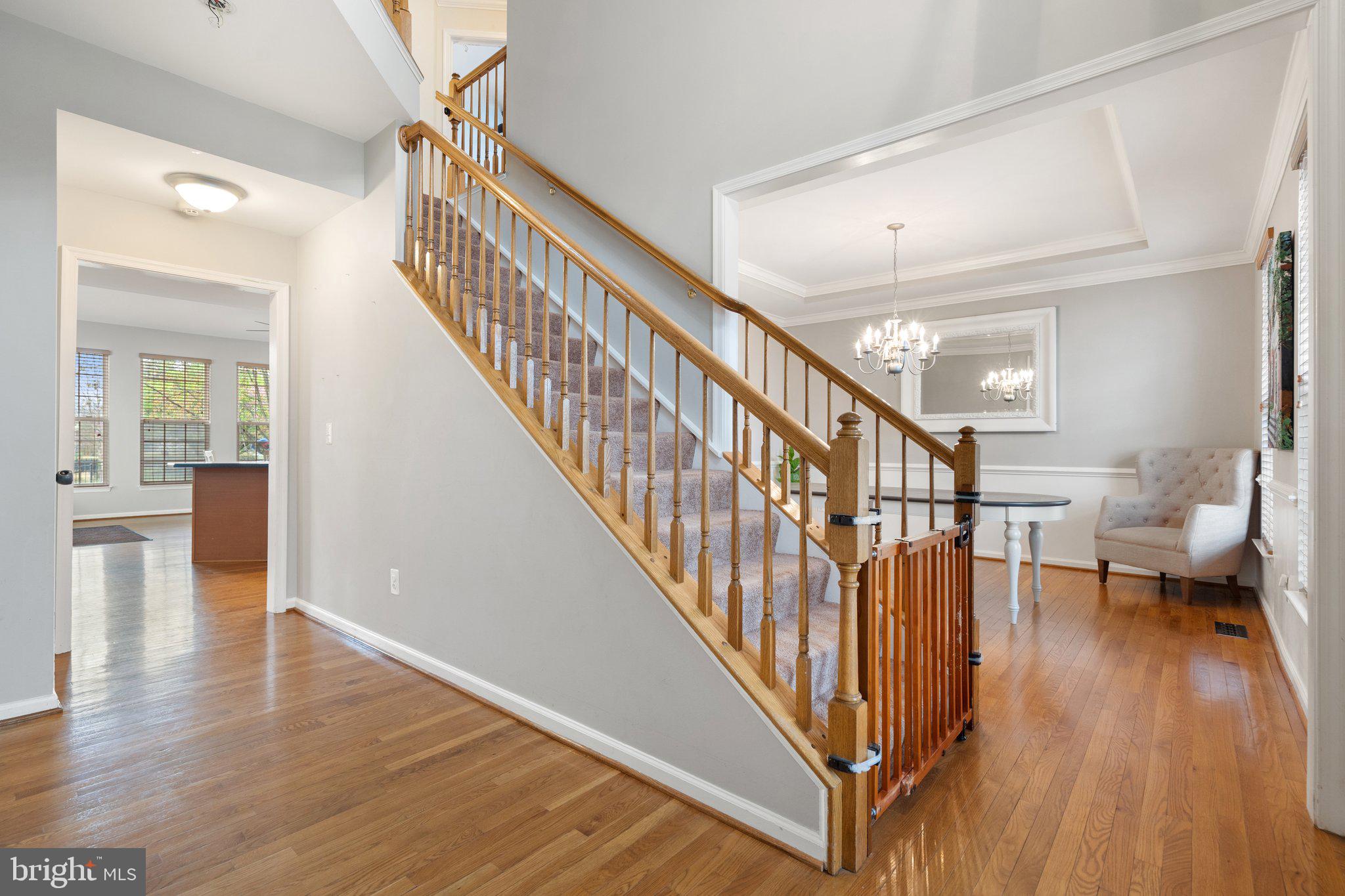 6754 Stapleton Place Gainesville, VA 20155 - Photo 18 of 39 a view of entryway with wooden floor