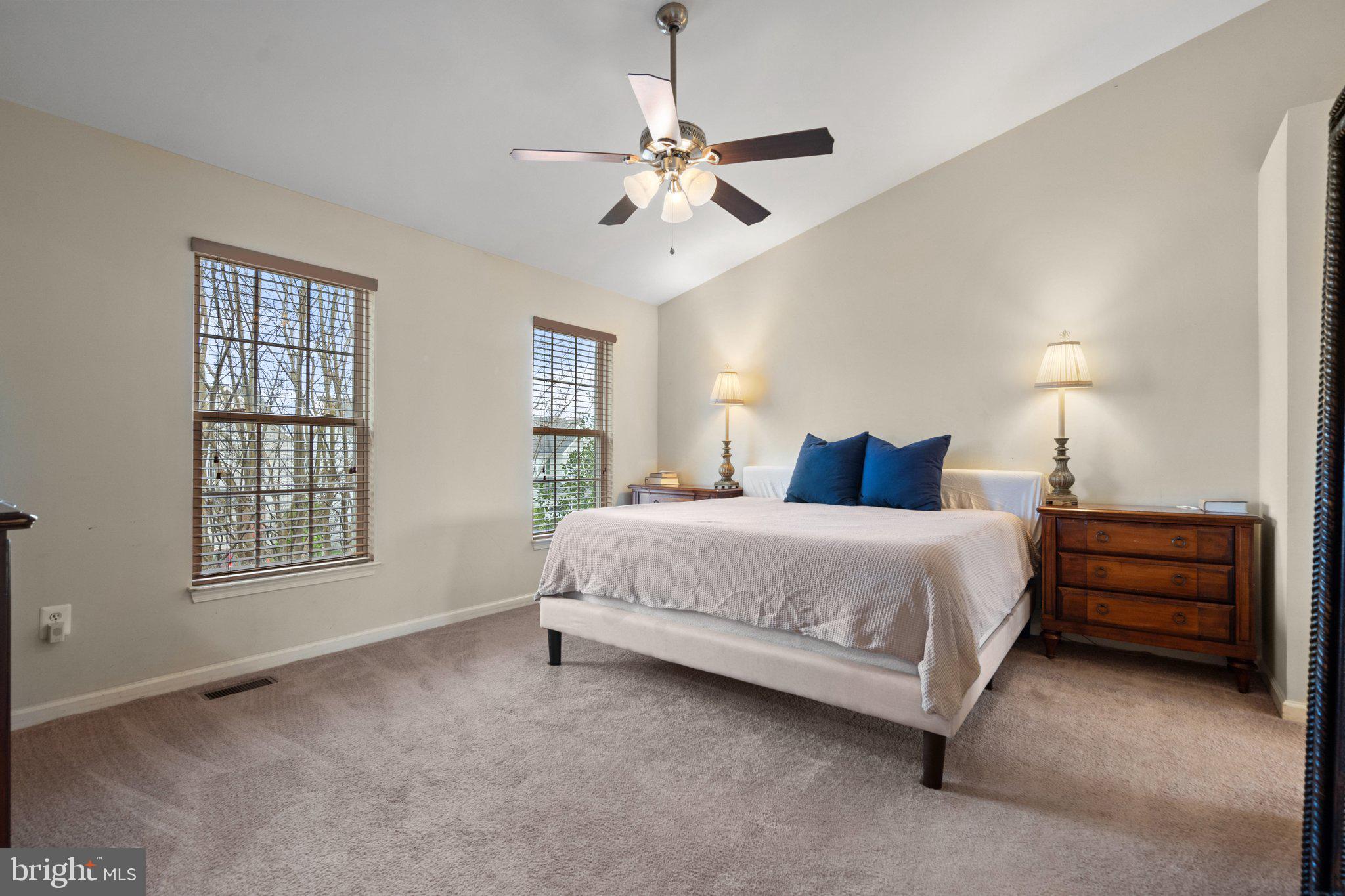 6754 Stapleton Place Gainesville, VA 20155 - Photo 20 of 39 a spacious bedroom with a bed and a window