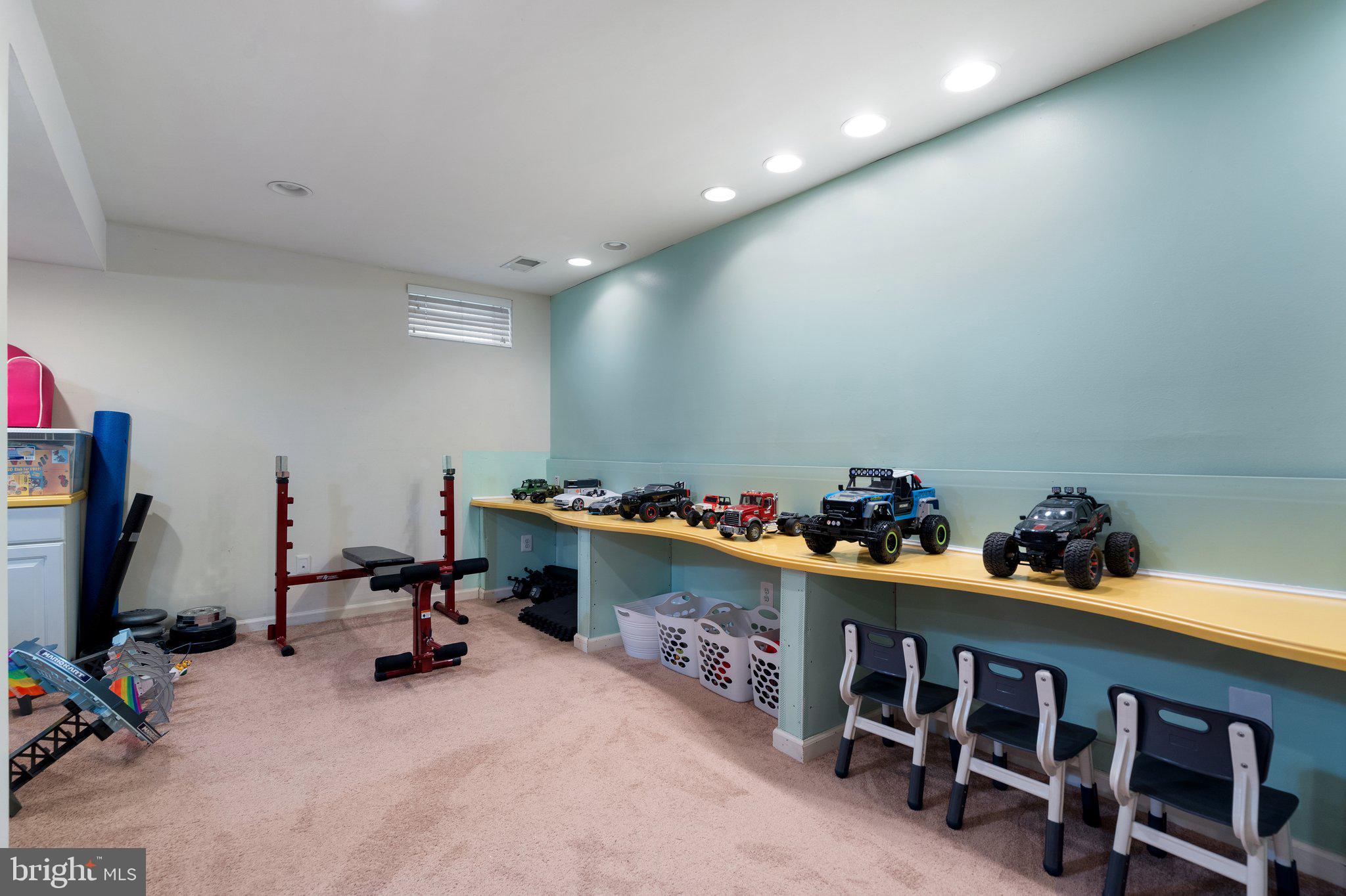 6754 Stapleton Place Gainesville, VA 20155 - Photo 31 of 39 a view of a room with gym equipment