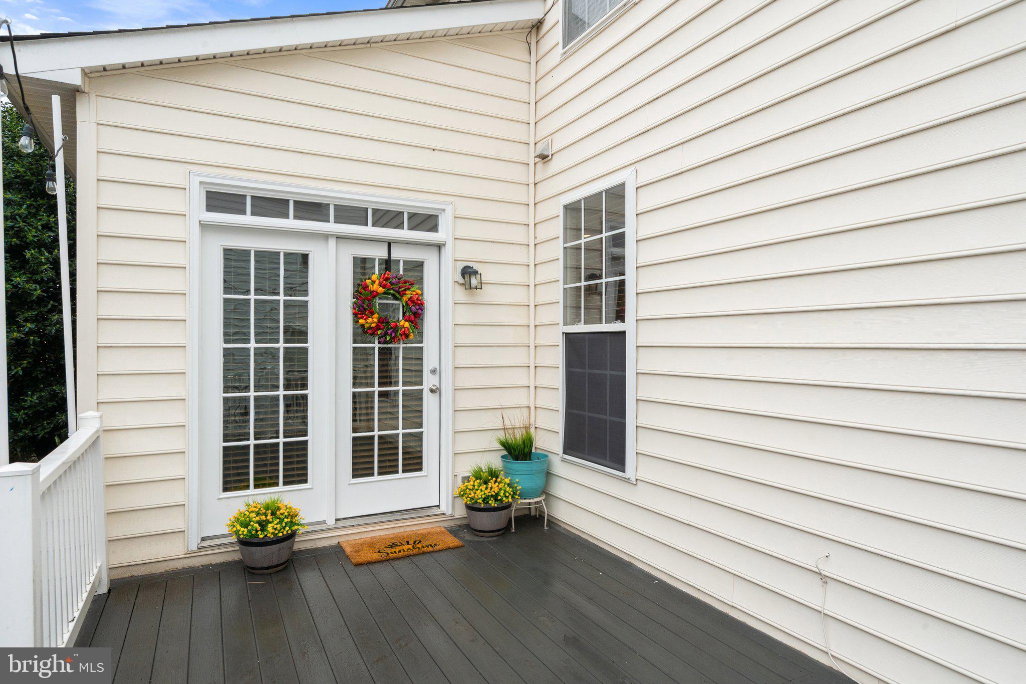 6754 Stapleton Place Gainesville, VA 20155 - Photo 32 of 39 a view of outdoor space with deck and furniture