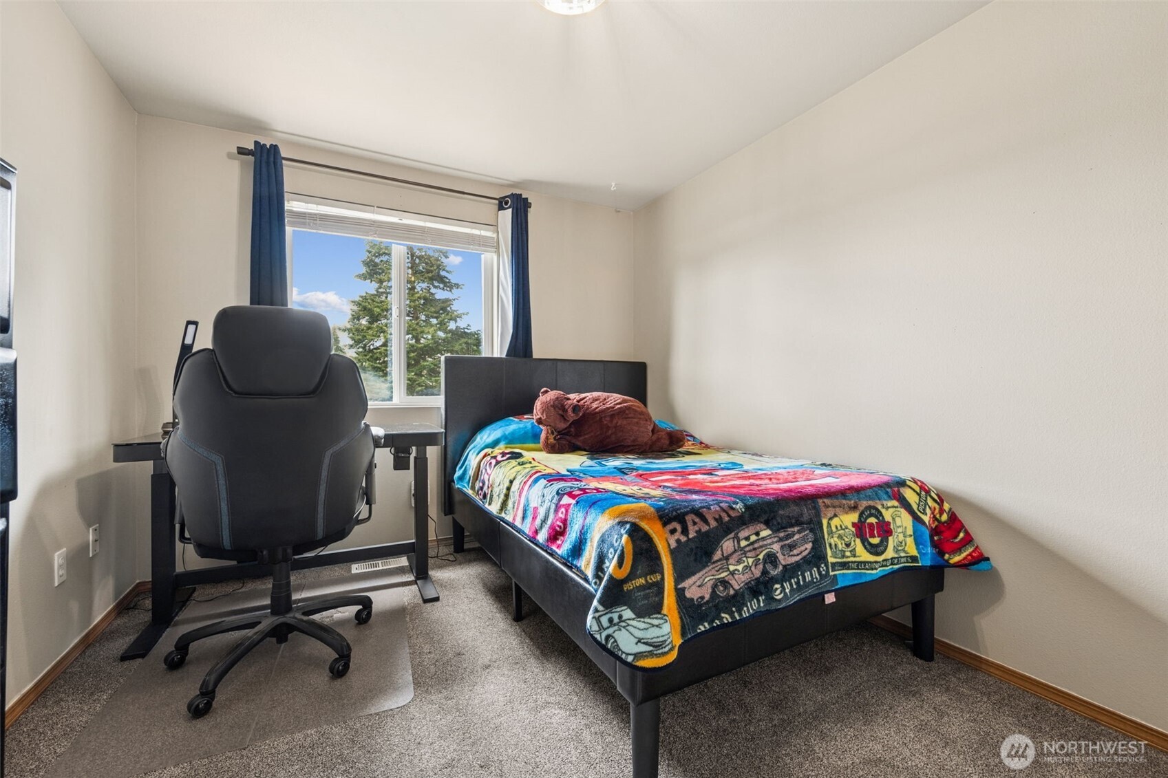 17837 Gilbert Street Southeast Tenino, WA 98589 - Photo 17 of 32 a bedroom with a bed chair and a window