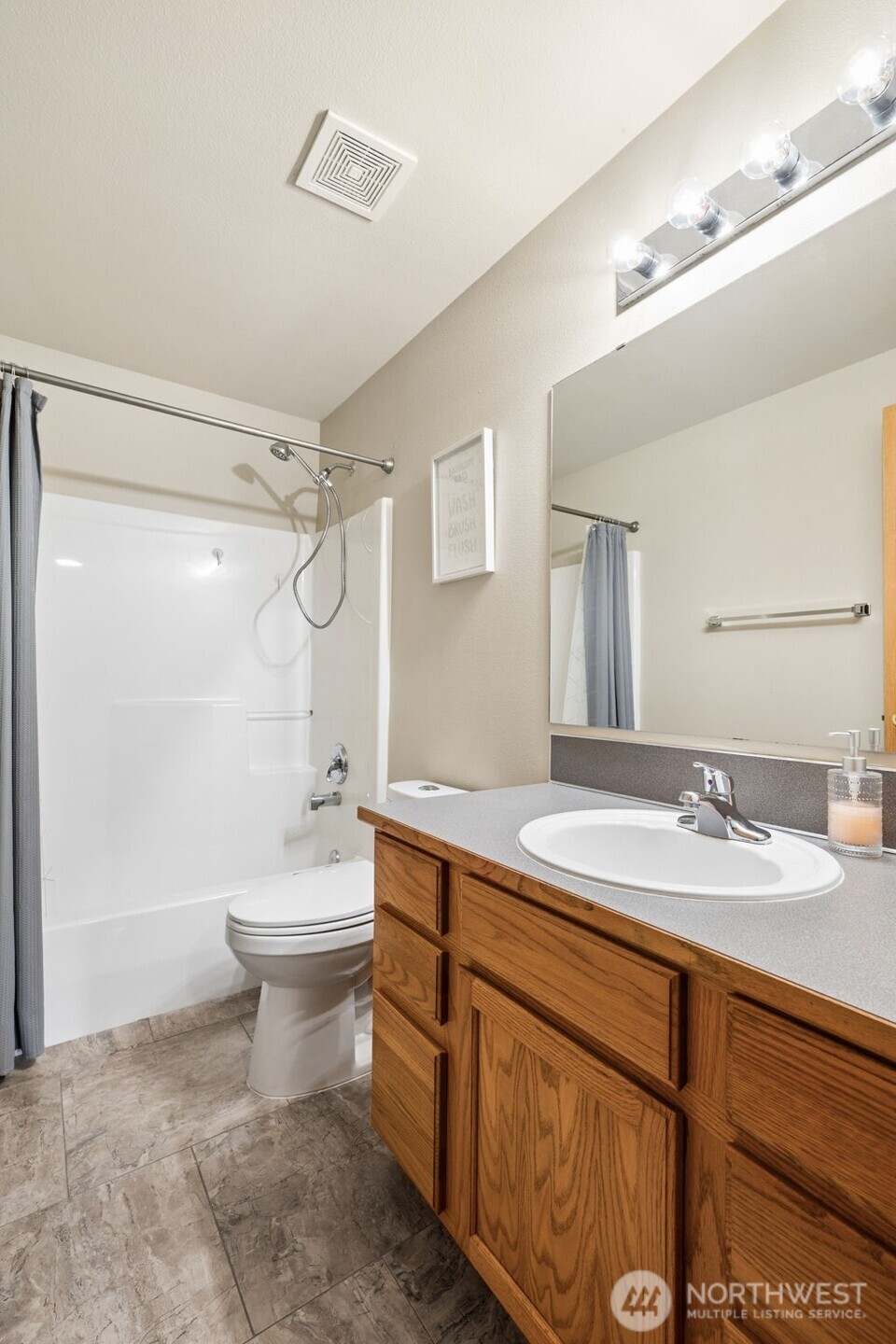 17837 Gilbert Street Southeast Tenino, WA 98589 - Photo 18 of 32 a bathroom with a sink a toilet and shower