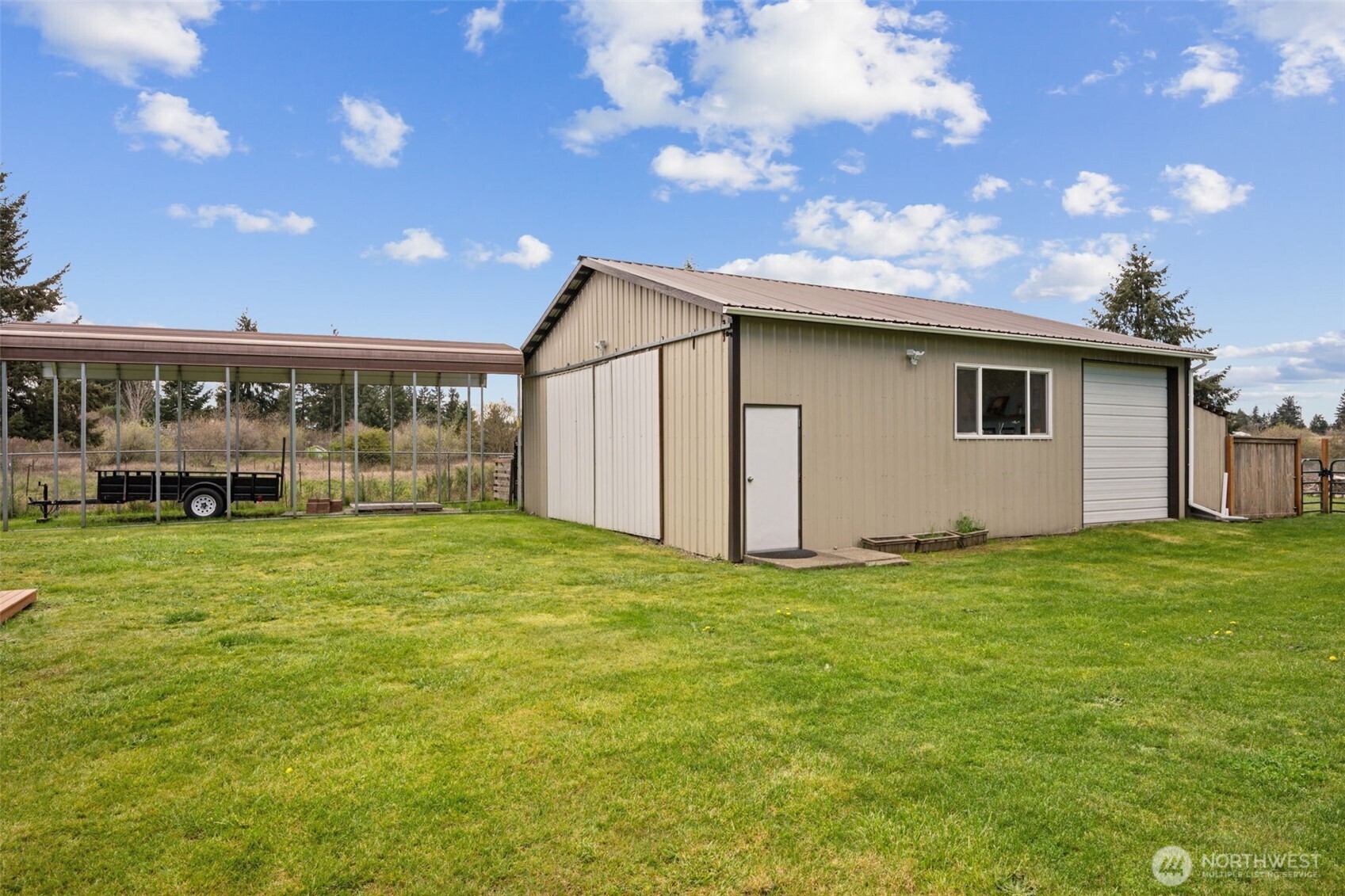 17837 Gilbert Street Southeast Tenino, WA 98589 - Photo 24 of 32 a backyard of a house with table and chairs