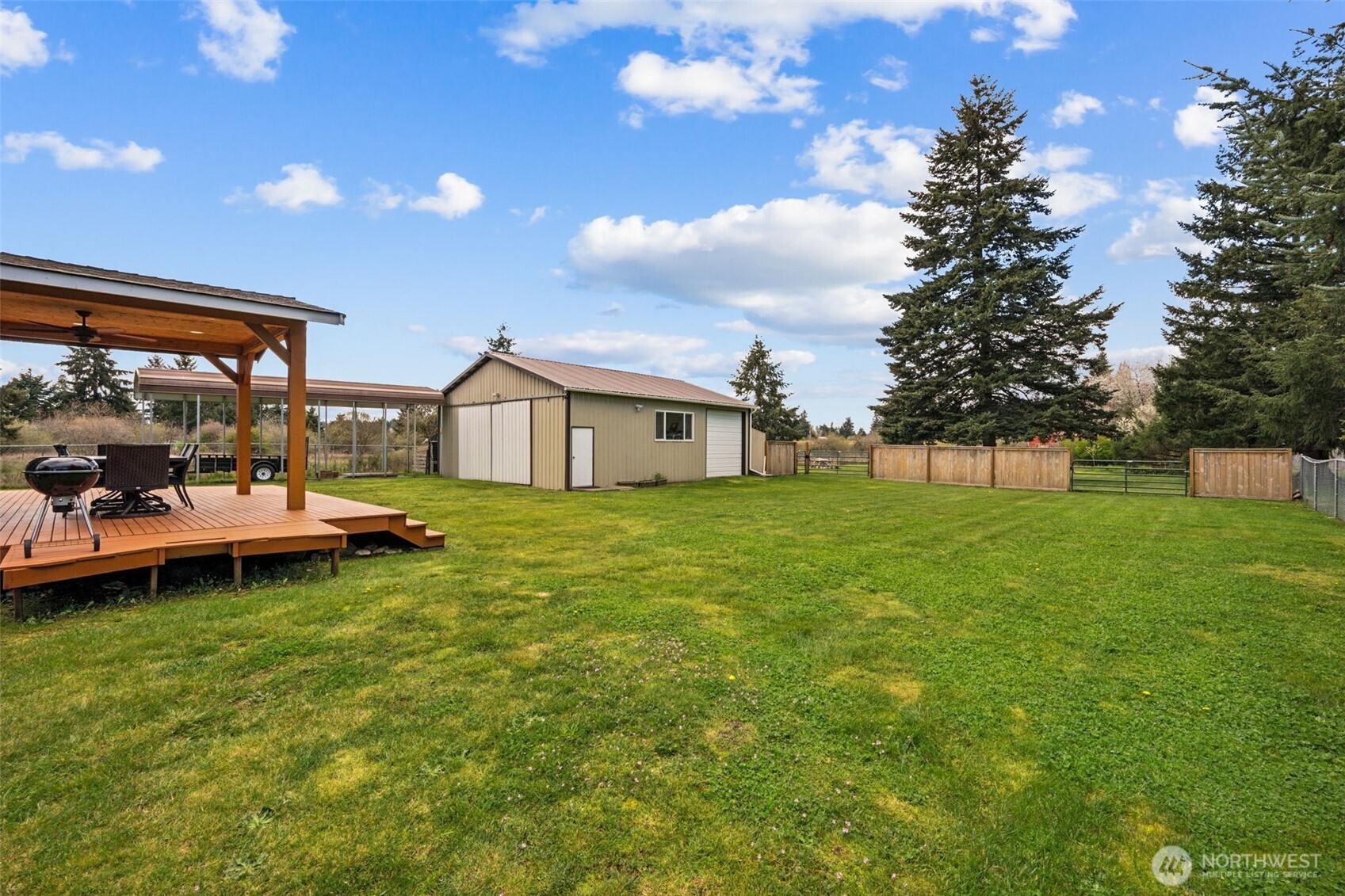 17837 Gilbert Street Southeast Tenino, WA 98589 - Photo 25 of 32 a view of a house with backyard and sitting area