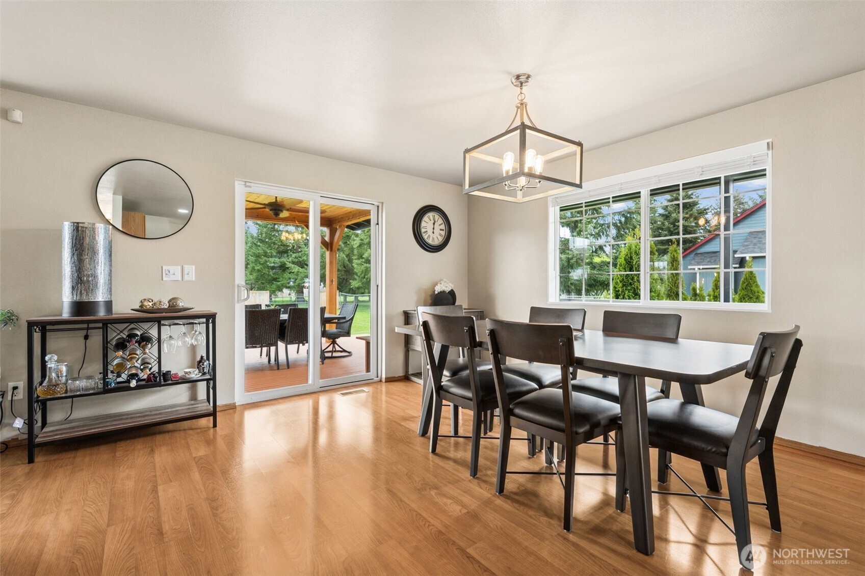 17837 Gilbert Street Southeast Tenino, WA 98589 - Photo 6 of 32 a view of a dining room with furniture window and wooden floor