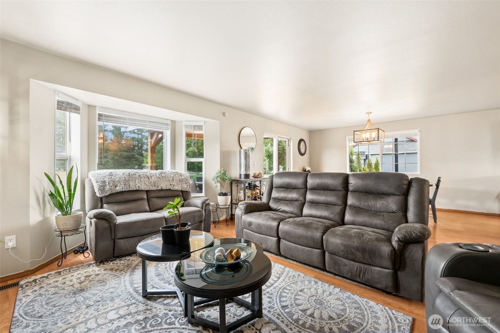 17837 Gilbert Street Southeast Tenino, WA 98589 - Photo 10 of 32 a living room with furniture and a large window