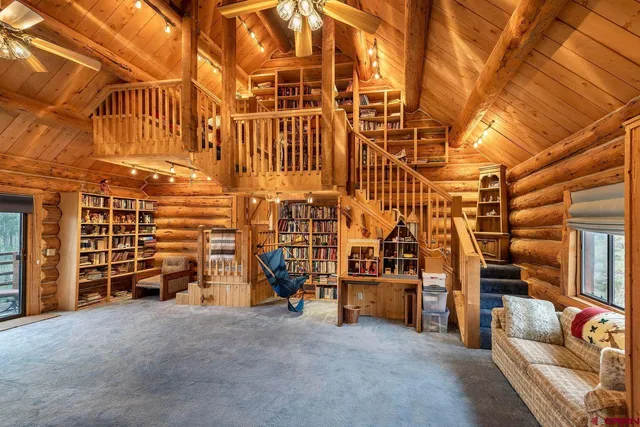 a view of an empty room with stairs