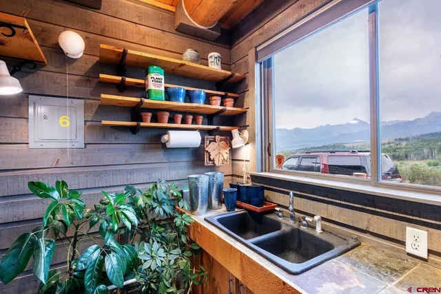 a kitchen with a sink and a stove