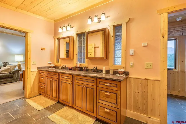 a bathroom with a shower and a bath tub