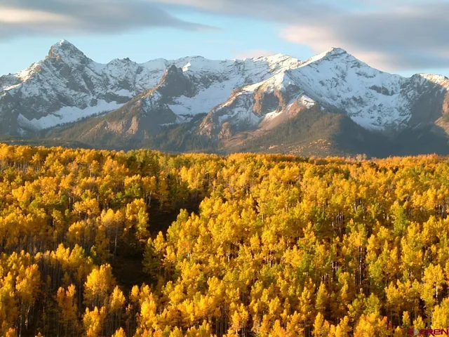 a view of mountain and a mountain