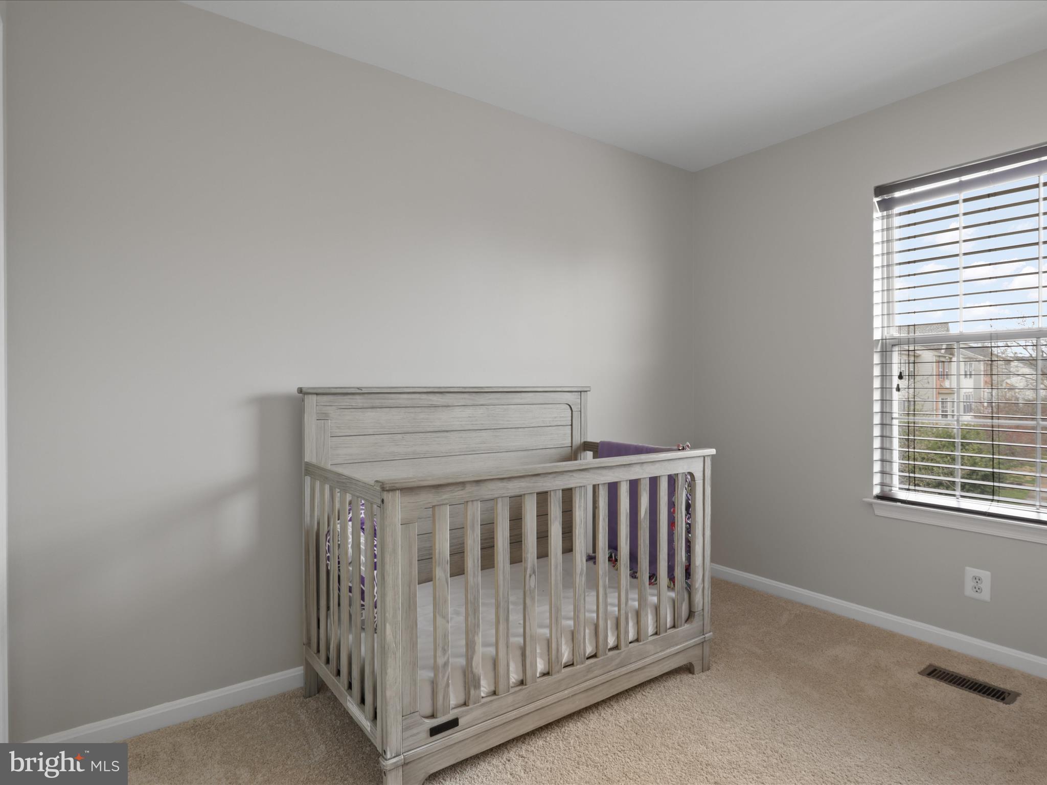 43271 Chokeberry Square Ashburn, VA 20147 - Photo 22 of 45 a view of hallway with a window