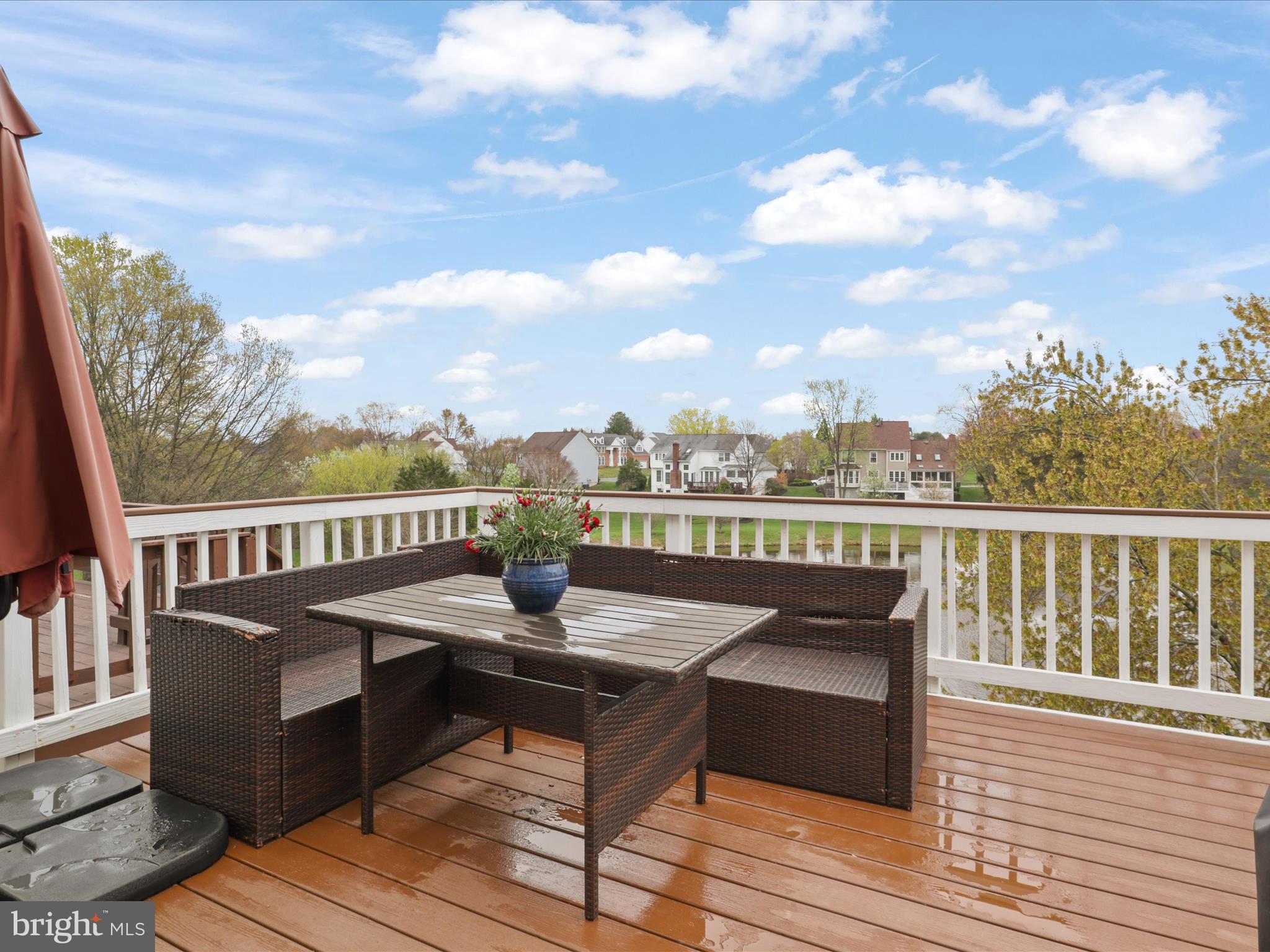 43271 Chokeberry Square Ashburn, VA 20147 - Photo 32 of 45 a view of a balcony with wooden floor