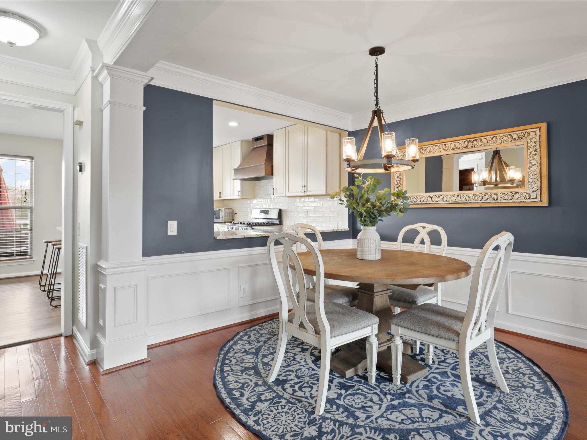 43271 Chokeberry Square Ashburn, VA 20147 - Photo 4 of 45 a view of a dining room with furniture window and wooden floor