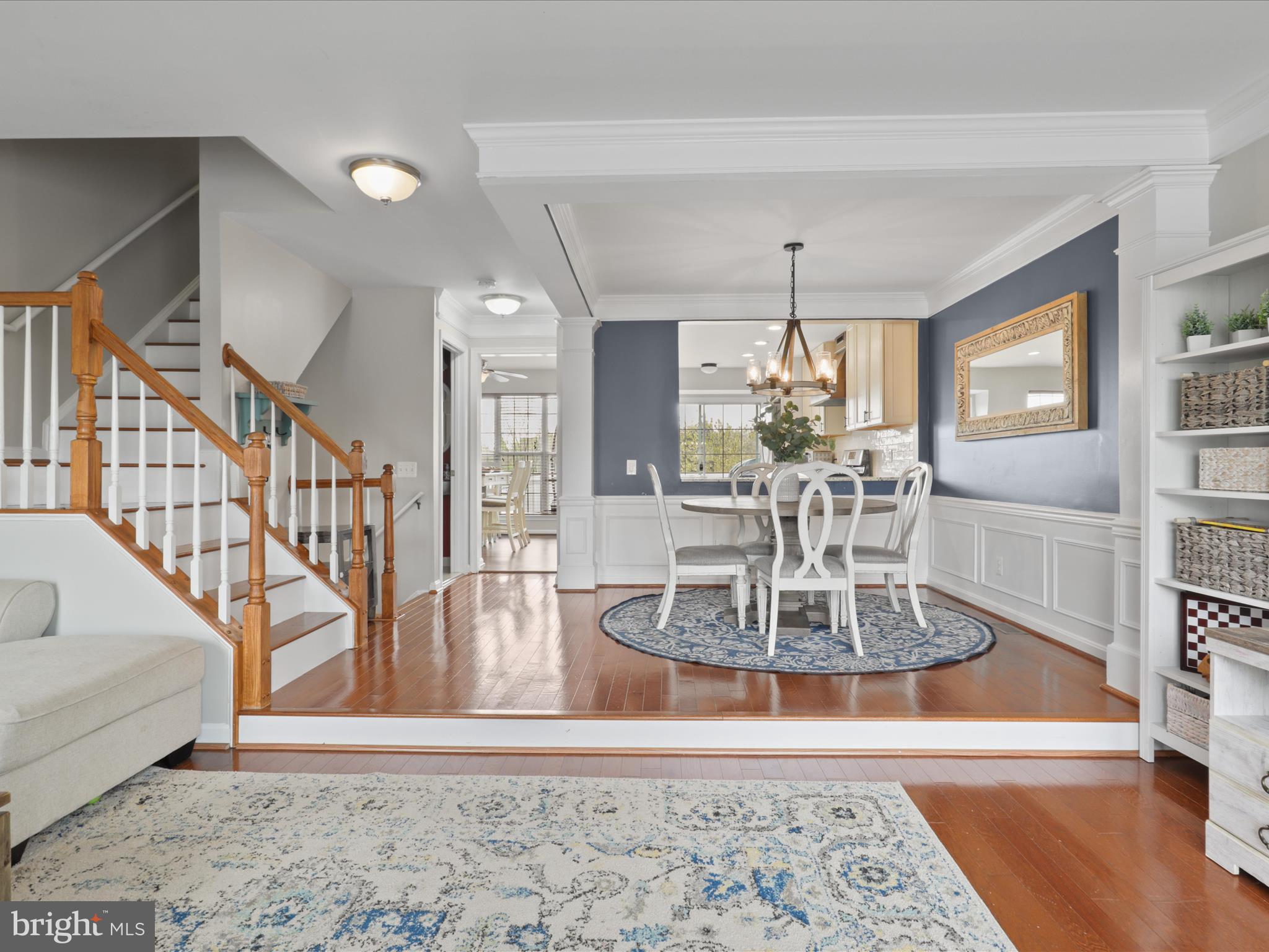 43271 Chokeberry Square Ashburn, VA 20147 - Photo 6 of 45 a view of a dining room with furniture window and wooden floor