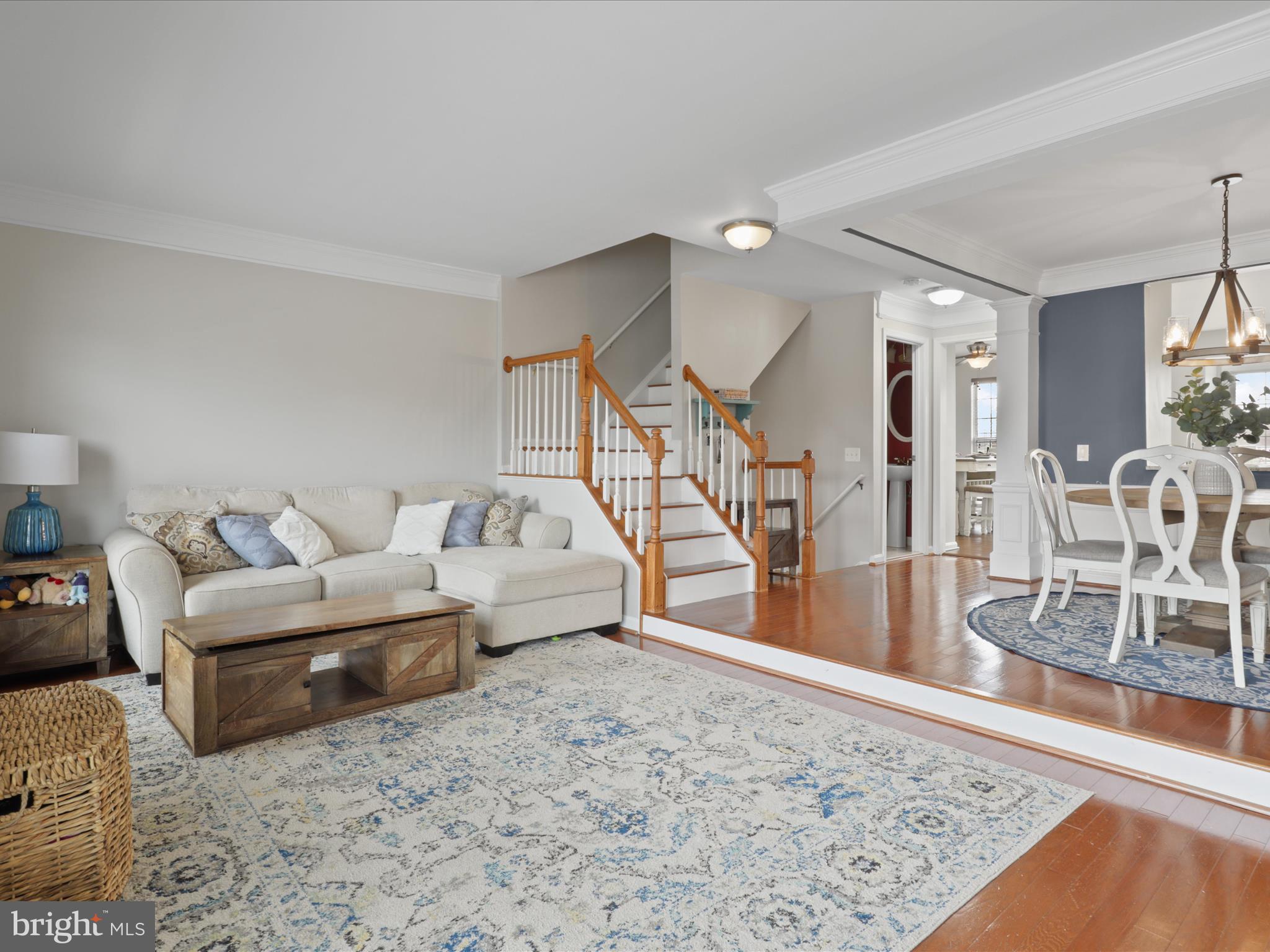43271 Chokeberry Square Ashburn, VA 20147 - Photo 7 of 45 a living room with furniture and a wooden floor