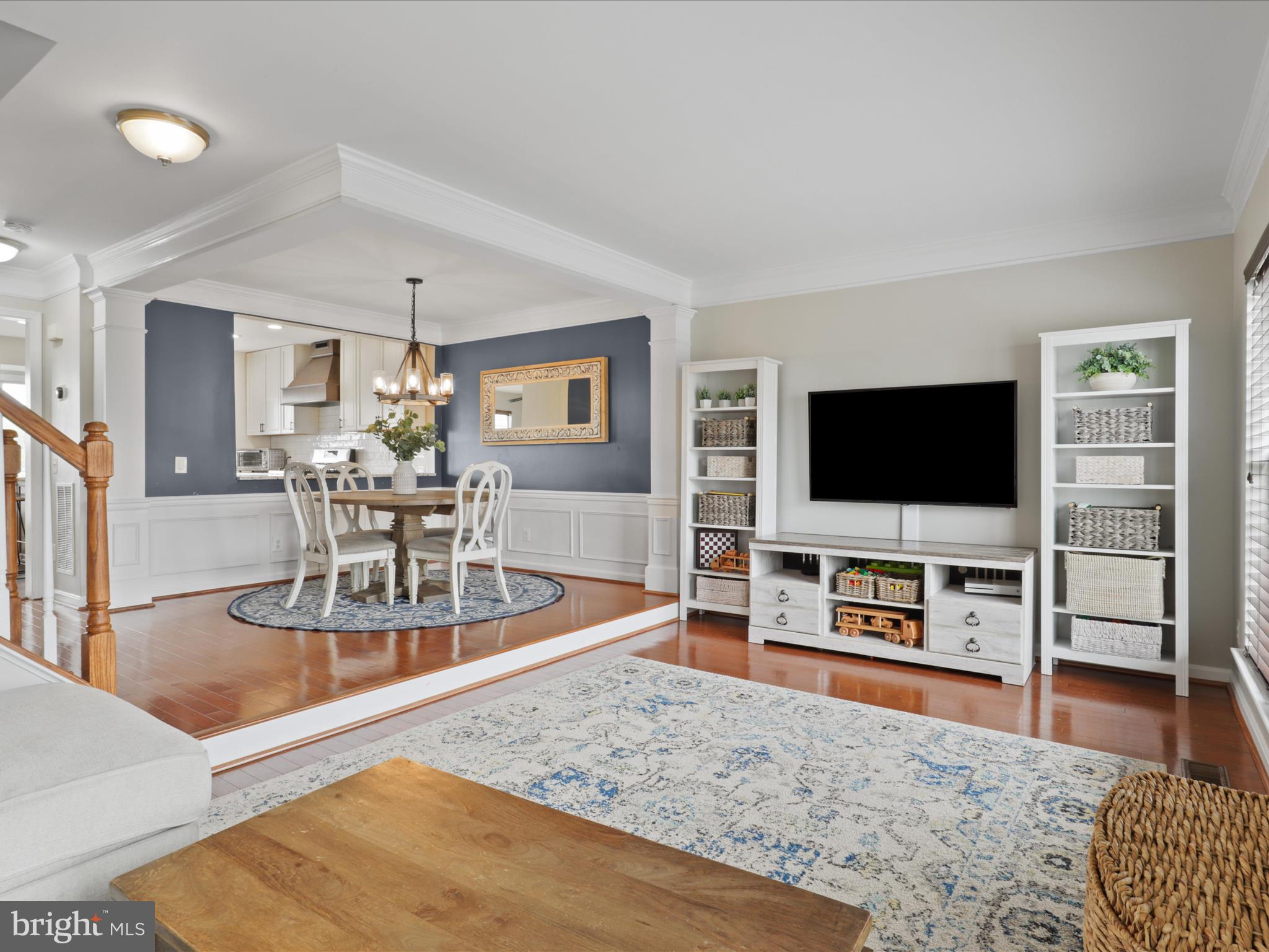 43271 Chokeberry Square Ashburn, VA 20147 - Photo 8 of 45 a living room with furniture and a flat screen tv