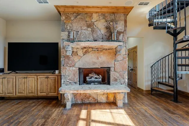 a kitchen with granite countertop a stove and a sink