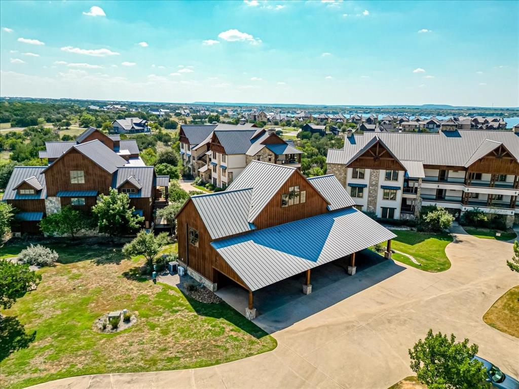 2034 Harbor Way, Unit 601 Graford, TX 76449 - Photo 2 of 27 an aerial view of a house with swimming pool