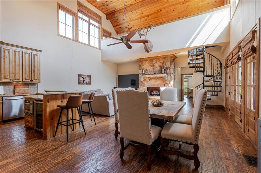 2034 Harbor Way, Unit 601 Graford, TX 76449 - Photo 5 of 27 a view of a dining room with furniture and wooden floor