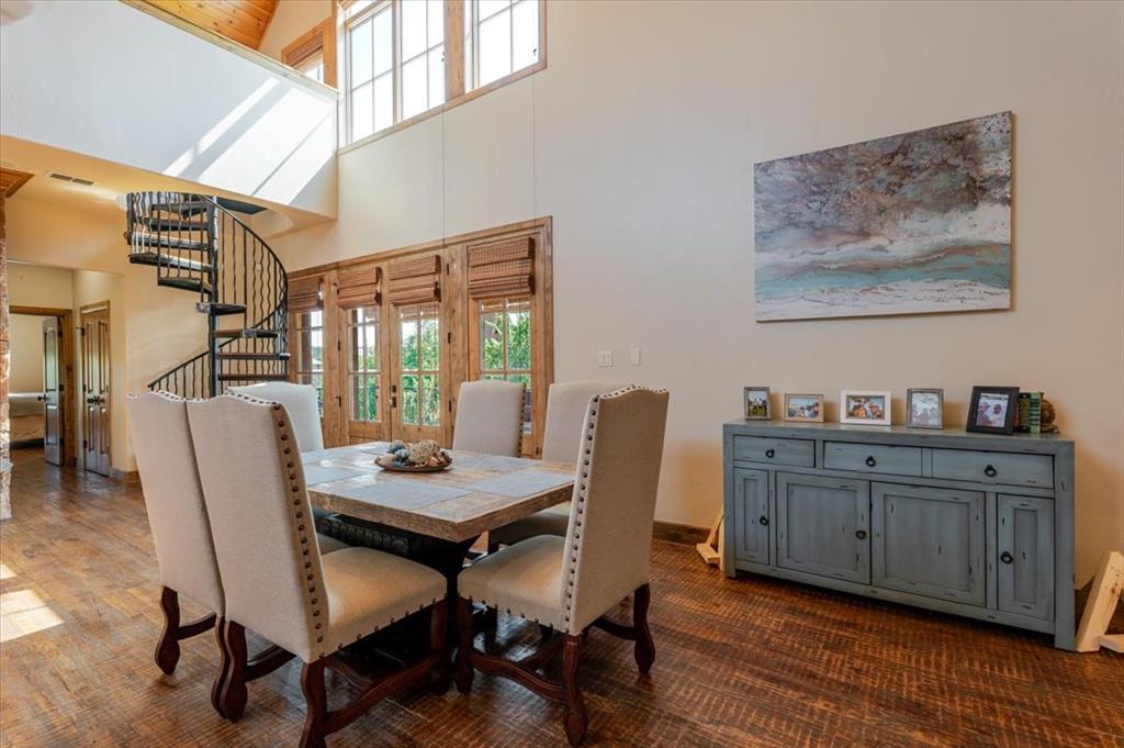 2034 Harbor Way, Unit 601 Graford, TX 76449 - Photo 6 of 27 a view of a workspace with furniture and wooden floor