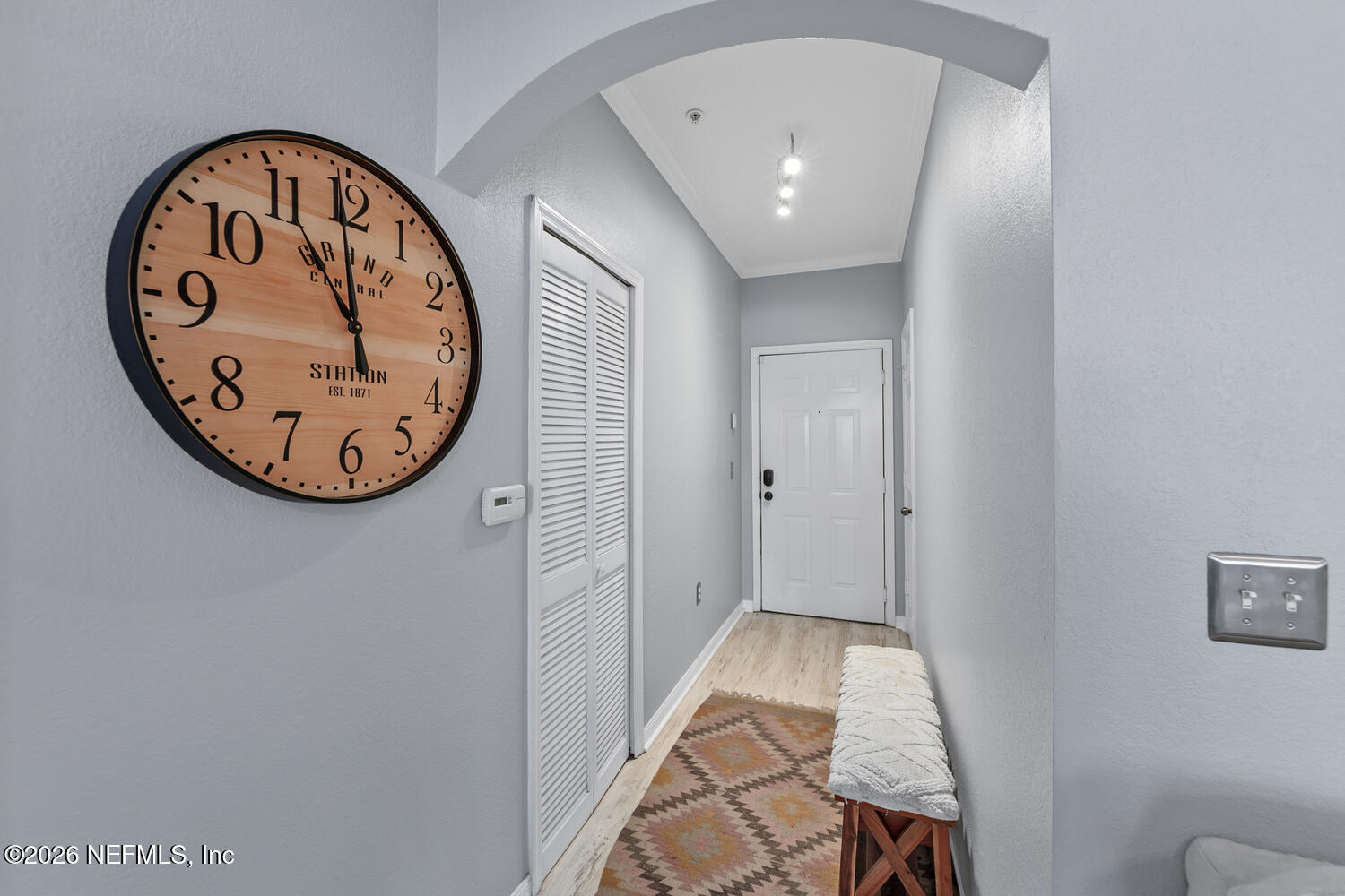 10961 Burnt Mill Road, Unit 317 Jacksonville, FL 32256 - Photo 3 of 39 an entryway with wooden floor