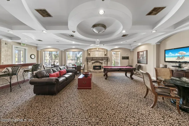 a view of a workspace with furniture